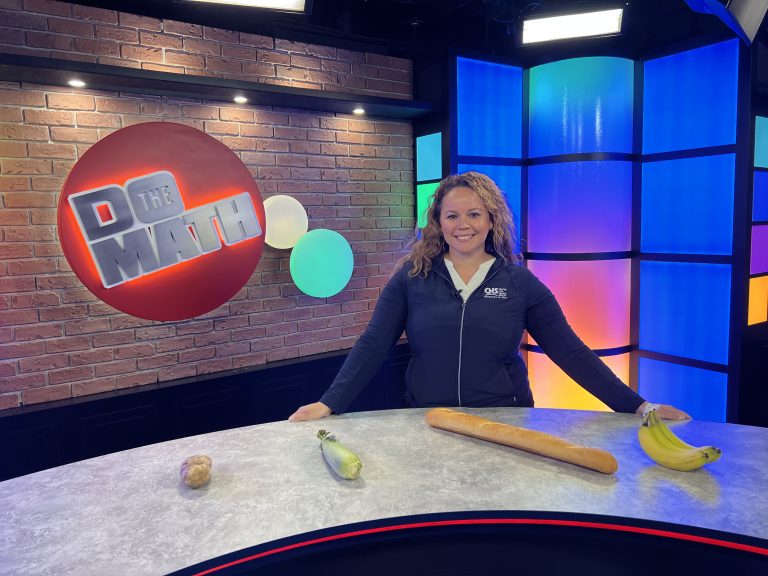 Stefanie Ramos on the set of Do the Math with grocery store props.