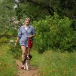 CNS patient Lillian Angelle walking her dog.