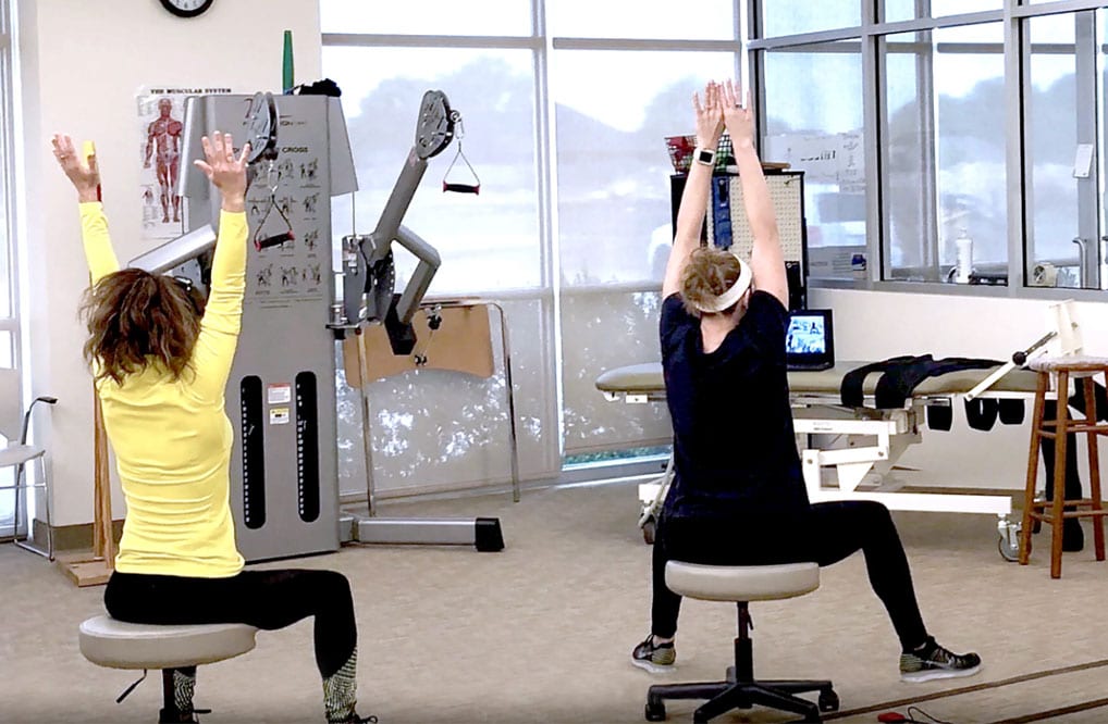 CNS therapists doing physical therapy via telerehab.